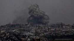 Smoke and explosions rise inside the Gaza Strip, as seen from southern Israel, March 17, 2024