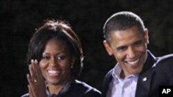 President Barack Obama, Michelle Obama. AP