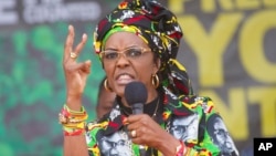 FILE - Zimbabwe's former first lady, Grace Mugabe, addressing party supporters at a ZANU PF rally in Chinhoyi on July 29, 2017.