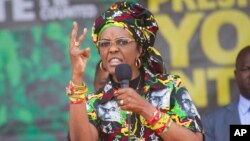 FILE - Zimbabwe's first lady, Grace Mugabe, addresses party supporters at a ZANU PF rally in Chinhoyi in this July 29, 2017 