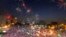 Fireworks burst over opponents of Egypt's Islamist President Mohamed Morsi, in Tahrir Square in Cairo, Egypt, July 2, 2013.