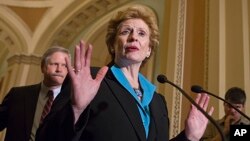 Sen. Debbie Stabenow, D-Mich., chairwoman of the Senate Agriculture Committee, speaks to reporters, June 10, 2013. 