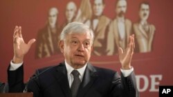 FILE - Mexico's President Andres Manuel Lopez Obrador holds his first news conference as president in Mexico City, Dec. 3, 2018. 