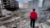 A man looks at buildings destroyed by Israeli airstrikes in Dahiyeh, Beirut, Lebanon, on Oct. 7, 2024.