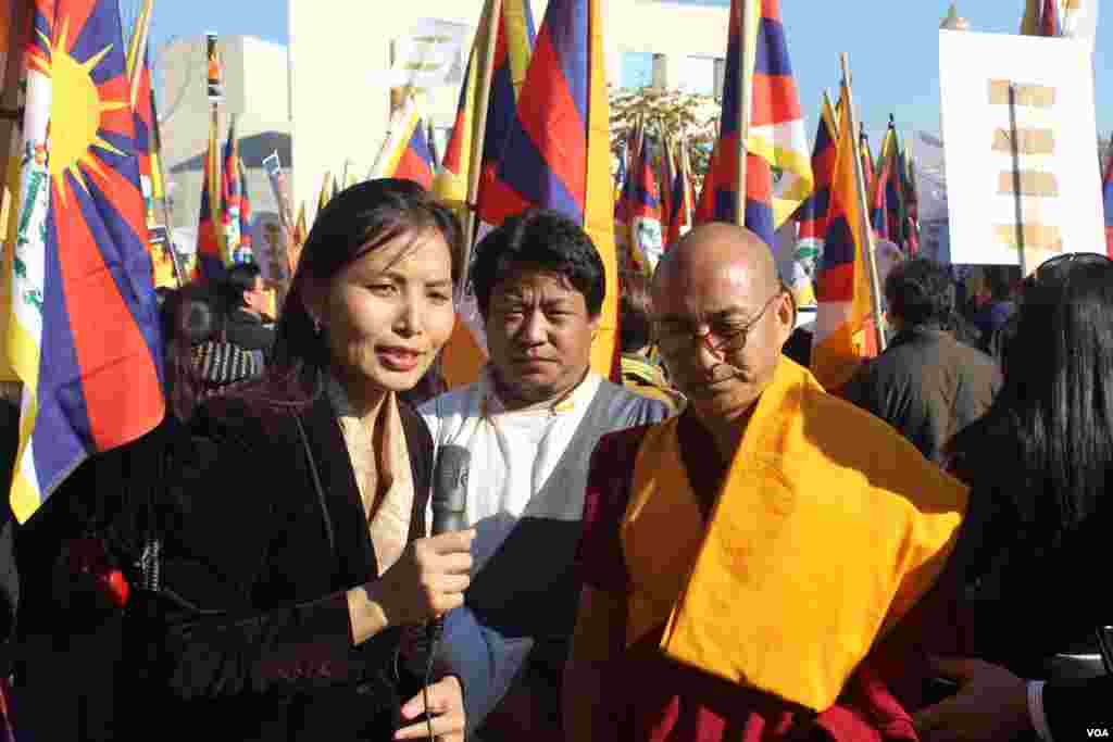 Sonam Yangzom reporting news from the Chinese Embassy in Washington DC