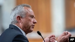 Robert F. Kennedy Jr., President Donald Trump's choice to be the secretary of health and human services, testifies before the Senate Finance Committee during his confirmation hearing, at the Capitol in Washington, Jan. 29, 2025.