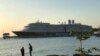 The cruise liner MS Westerdam, carrying more than 2,000 passengers, docked near the pier inside Sihanouville port about 6 p.m. Feb. 13, 2020, after being turned away by four countries.(Kann Vicheika/VOA Khmer)