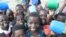 Students in Kanje school celebrate after eat porridge (Mary's Meals)