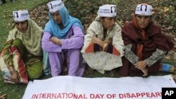 Relatives of missing Kashmiri youths participate in a protest organized by the Association of Parents of Disappeared Persons in Srinagar, India, August 29, 2011