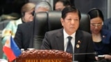 FILE - Philippine President Ferdinand Marcos Jr. listens during the 12th Association of Southeast Asian Nations-U.S. Summit in Vientiane, Laos, Oct. 11, 2024. 