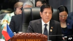 FILE - Philippine President Ferdinand Marcos Jr. listens during the 12th Association of Southeast Asian Nations-U.S. Summit in Vientiane, Laos, Oct. 11, 2024. 