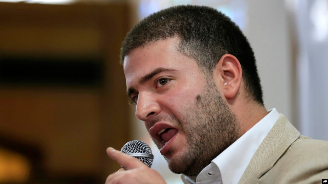 Osama Morsi, son of ousted Egyptian President Mohamed Morsi, speaks during a press conference in Cairo, July 22, 2013. 
