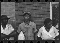 Sharecroppers in Marked Tree, Arkansas, 1935. (Photo by Ben Shahn)