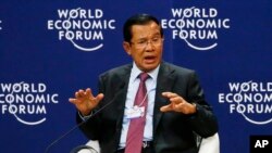 Prime Minister Hun Sen of Cambodia gestures as he talks about his vision for the Mekong region in the World Economic Forum on ASEAN at the National Convention Center Wednesday, Sept. 12, 2018, in Hanoi, Vietnam. The World Economic Forum has attracted hundreds of participants for the three-day forum with the theme: ASEAN 4.0: Entrepreneurship and the Fourth Industrial Revolution. (AP Photo/Bullit Marquez)