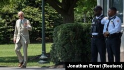 U.S. President Joe Biden walks out to depart for Delaware via Marine One from the South Lawn of the White House in Washington, U.S. August 6, 2021. 