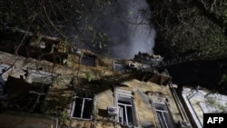 This photograph shows a heavily damaged residential building following a Russian strike in Odesa on Nov. 15, 2024, amid the Russian invasion of Ukraine. 