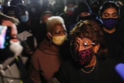 Maxine Waters with protesters rallying outside of the Brooklyn Center Police Department in Brooklyn Center, Minnesota, April 18, 2021.