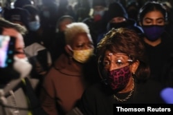 Maxine Waters with protesters rallying outside of the Brooklyn Center Police Department in Brooklyn Center, Minnesota, April 18, 2021.