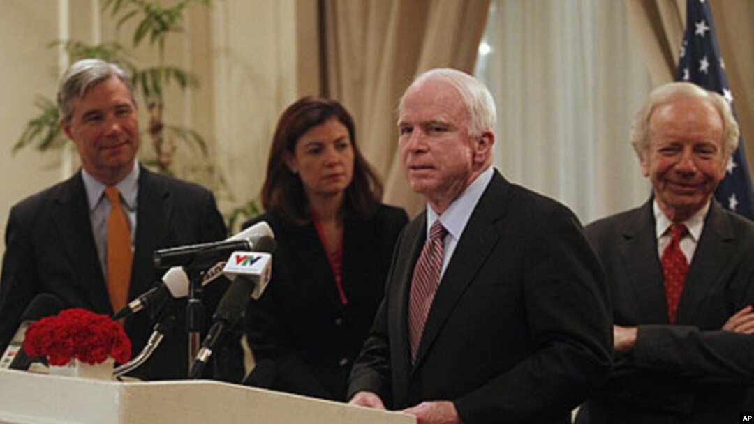 U.S. Senator John McCain (2nd R) speaks as Senators Joseph Lieberman, Sheldon Whitehouse (L) and Kelly Ayotte (2nd L) look on during a press briefing in Hanoi January 19, 2012, one of the stops on their visit to Asia.