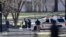 Law enforcement officers are seen gathered near the White House in Washington, March 3, 2018.