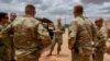 FILE - U.S. Army Brig. Gen. Damian T. Donahoe, deputy commanding general, Combined Joint Task Force-Horn of Africa, center, talks with service members during a battlefield circulation, Sept. 5, 2020, in Somalia.