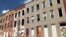An entire block of vacant row houses in West Baltimore, within the 7th Congressional District of Representative Elijah Cummings. (VOA/C. Presutti)