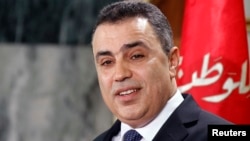 FILE - Tunisia's then prime minister Mehdi Jomaa speaks during a news conference in Tunis, Jan. 26, 2014.