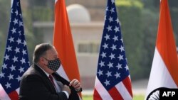 U.S. Secretary of State Mike Pompeo leaves after addressing a joint press briefing on the lawns of Hyderabad House in New Delhi, Oct. 27, 2020.