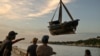 Fishermen remove their boats from the water ahead of the arrival of then-Tropical Storm Rafael in Havana on Nov. 5, 2024.