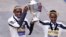 Benson Kipruto, left, and Diana Kipyogei, right, both of Kenya, celebrate at the finish line after winning the men's and women's division of the Boston Marathon in Boston, Oct. 11, 2021.