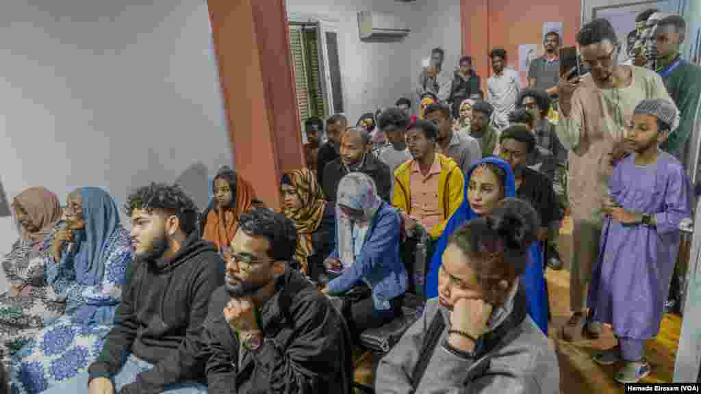 Sudanese community members learn about Egypt’s Law Regarding the Asylum of Foreigners a few days before its ratification, in Cairo on Nov. 11, 2024. The bill calls for a new state-run committee to consolidate control over the asylum process.