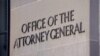A sign of the Office of the Attorney General is displayed on the Department of Justice building the day after Special Counsel Robert Mueller delivered his report into Russia's role in the 2016 U.S. election. 