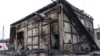 A burned commercial structure is pictured in Maputo, Mozambique, Dec. 24, 2024. More than 1,500 prisoners escaped from a prison near Maputo the next day, amid unrest triggered by confirmation of the Frelimo party as the winner of recent elections.