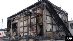 A burned commercial structure is pictured in Maputo, Mozambique, Dec. 24, 2024. More than 1,500 prisoners escaped from a prison near Maputo the next day, amid unrest triggered by confirmation of the Frelimo party as the winner of recent elections.