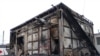 A burned commercial structure is pictured in Maputo, Mozambique, Dec. 24, 2024. More than 1,500 prisoners escaped from a prison near Maputo the next day, amid unrest triggered by confirmation of the Frelimo party as the winner of recent elections.