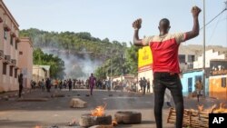 In this photo taken Friday, June 19, 2020, protesters demanding President Ibrahim Boubacar Keita's resignation take to the streets in the capital Bamako, Mali.