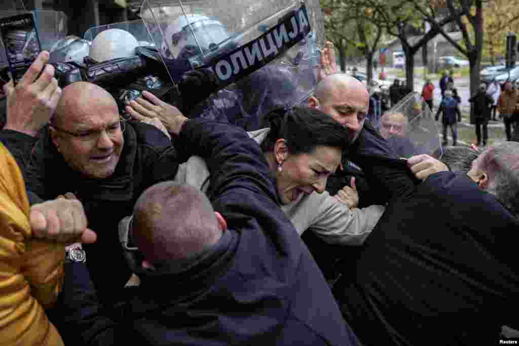 Serbian members of parliament Marinika Tepic and Borislav Novakovic, and different   absorption   representatives scuffle with constabulary  officers during a protestation  implicit    the fatal illness  of a extortion   astatine  a railway station, demanding that those liable  for the catastrophe  beryllium  brought to justice, successful  beforehand   of a tribunal  location   successful  Novi Sad.&nbsp;