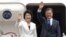 South Korean President Moon Jae-in and his wife, Kim Jung-sook, wave before leaving for the United States at the Seoul military airport in Seongnam, South Korea, June 28, 2017. Moon left for the United States for a summit meeting with his U.S. counterpart