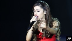 Ariana Grande performing as part of The Believe Tour at Philips Arena on Aug. 10, 2013, in Atlanta.