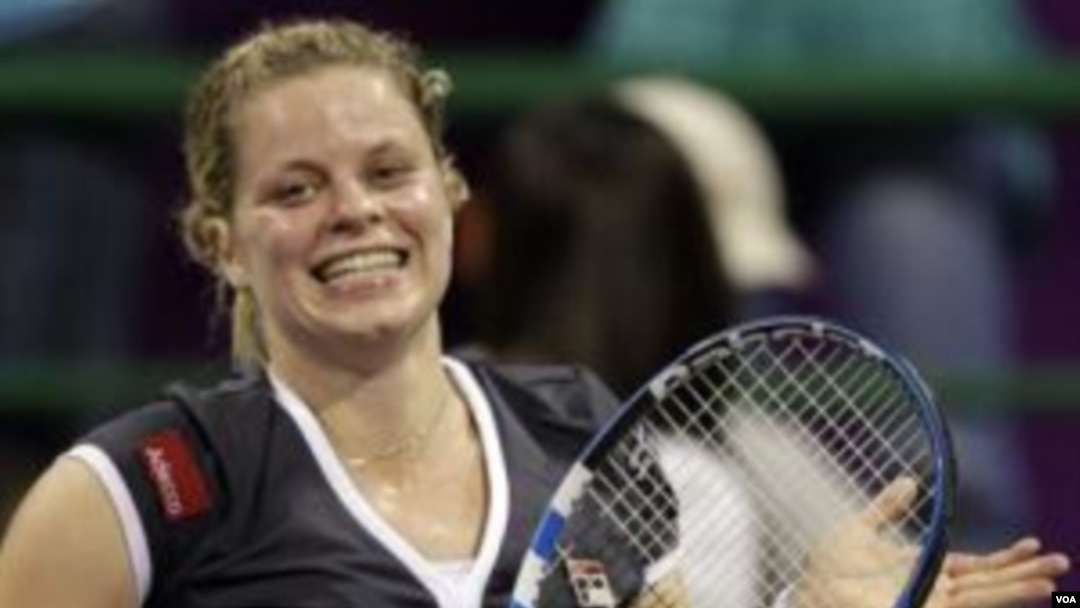 Petenis Belgia Kim Clijsters akan bermain bersama rekan senegaranya Justine Henin dalam kejuaraan Piala Fed bulan depan.