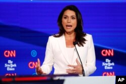 Rep. Tulsi Gabbard, D-Hawaii, participates in a Democratic presidential candidates debate at Otterbein University, Oct. 15, 2019, in Westerville, Ohio.