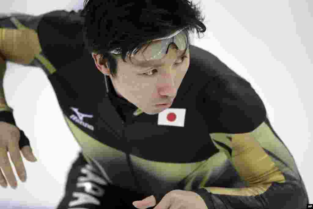 Yuji Kamijo of Japan practices his start for the men&#39;s 500-meter speedskating race at the Adler Arena Skating Center, Sochi, Russia, Feb. 10, 2014.