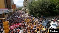 Opposition supporters demonstrate against Venezuela's President Nicolas Maduro's government in Caracas, Feb 12, 2014.