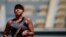 Naomi Osaka célèbre sa victoire contre Patricia Maria Tig lors du tournoi de tennis de Roland Garros, France, le 30 mai 2021.