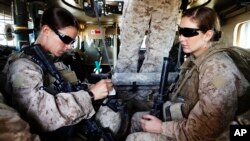 U.S. Marines head out on an operation from their base at Musa Qala in southern Afghanistan's Helmand province, Nov. 13, 2010.