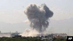 Smoke rises after an explosion in Kabul, Afghanistan, July 1, 2019. 