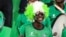A Nigeria supporter cheers prior to the Group D Africa Cup of Nations (CAN) 2021 football match between Nigeria and Sudan at Stade Roumde Adjia in Garoua, Jan. 15, 2022.