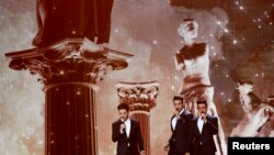 The band Il Volo representing Italy performs the song "Grande Amore" during the first dress rehearsal for the final of the upcoming 60th annual Eurovision Song Contest In Vienna, May 22, 2015. 