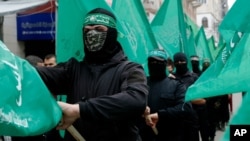 Militants du Hamas défilant à Gaza, le 14 février 2020. (Photo AP)