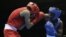 Kenya's Benson Njangiru fights Egypt's Hesham Abdelaal, left, in boxing match at the 2012 Summer Olympics in London.